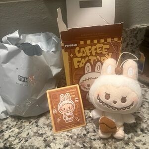 Pop Mart labubu authentic coffee factory new never used USA